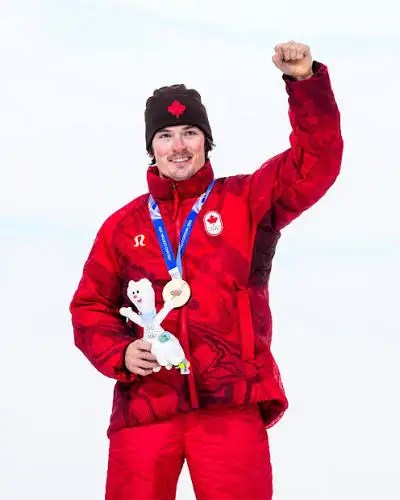 Brendan Mackay celebrating his Olympic bronze medal